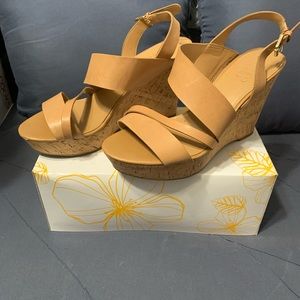 Women’s tan strapped wedged sandal. Size 9m. By Franco Sarto.